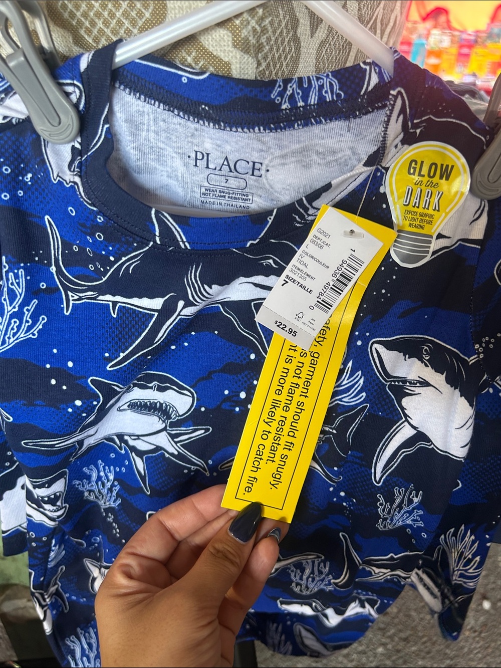 The Children's Place Navy Blue & White Shark Glow-in-the-Dark Pajama set.